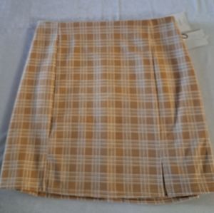 Originality beige and white plai Mini skirt with double slits in front. Size L.